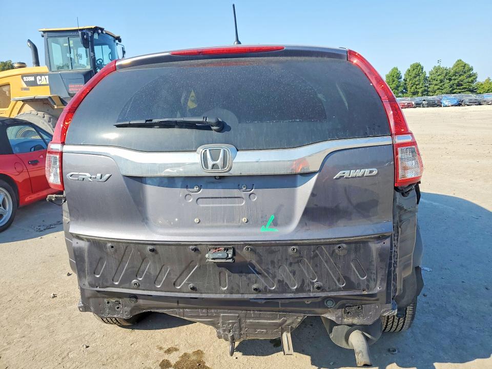 Photo 6 from auction – 2016 HONDA CR-V with VIN 5J6RM4H44GL049747