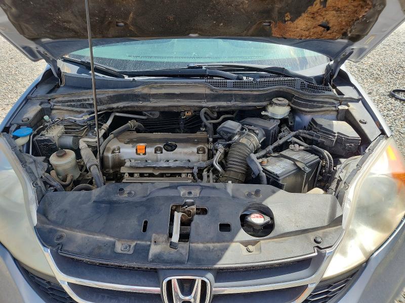 Photo 12 from auction – 2011 HONDA CR-V with VIN JHLRE4H30BC010093