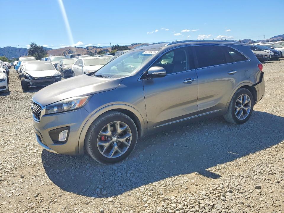 KIA SORENTO 2017 with VIN 5XYPK4A53HG303970 - Photo from auction
