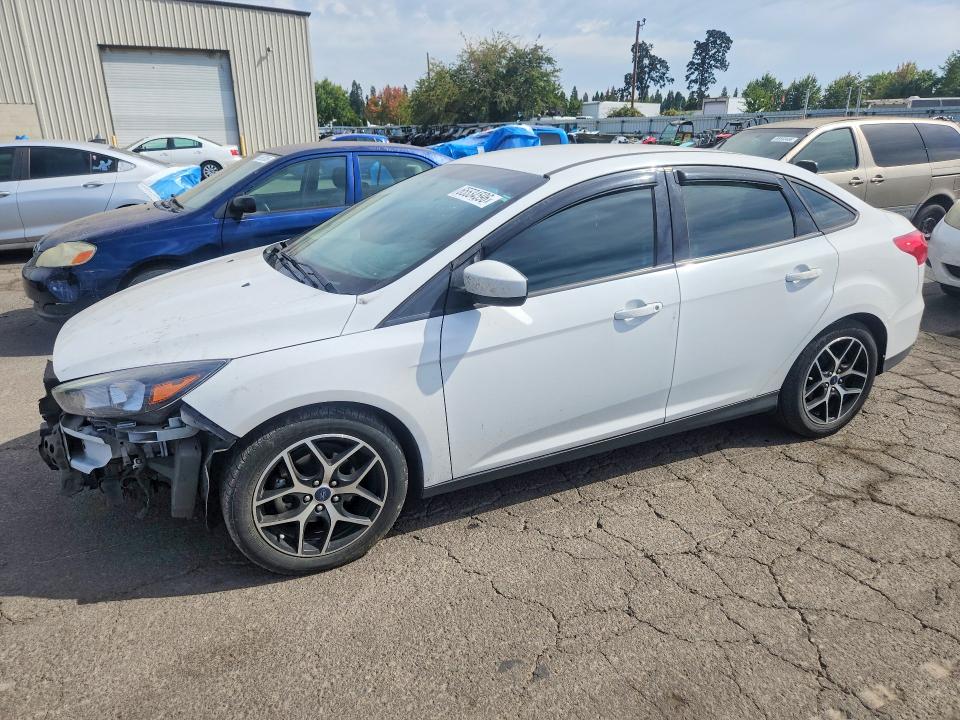 FORD FOCUS 2018 with VIN 1FADP3FE2JL288157 - Photo from auction
