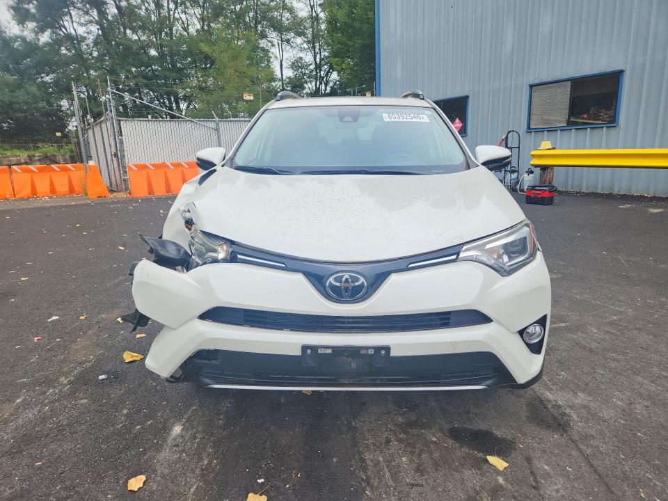 Photo 5 from auction – 2018 TOYOTA RAV4 with VIN JTMDFREV7JJ733084