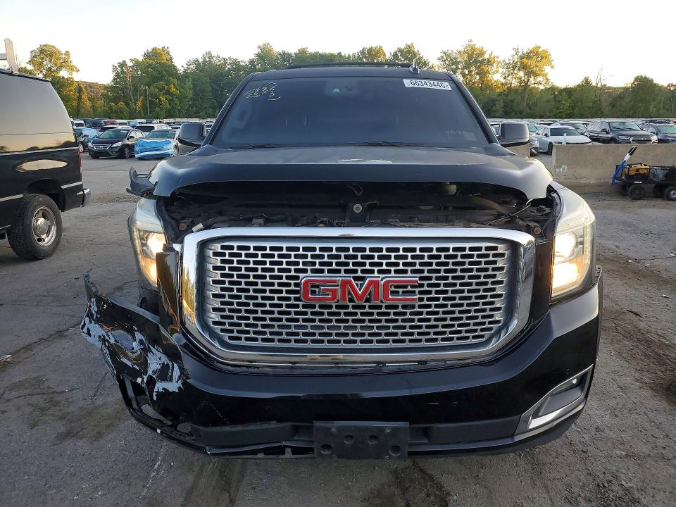 Foto 5 de la subasta – 2016 GMC YUKON con VIN 1GKS2CKJ4GR218544