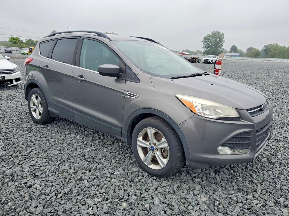 Photo 4 from auction – 2014 FORD ESCAPE with VIN 1FMCU9GX7EUB14713