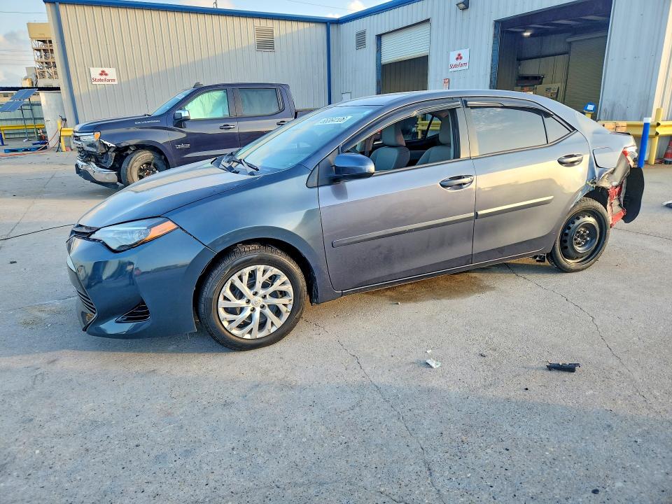 TOYOTA COROLLA 2018 with VIN 5YFBURHE5JP823774 - Photo from auction