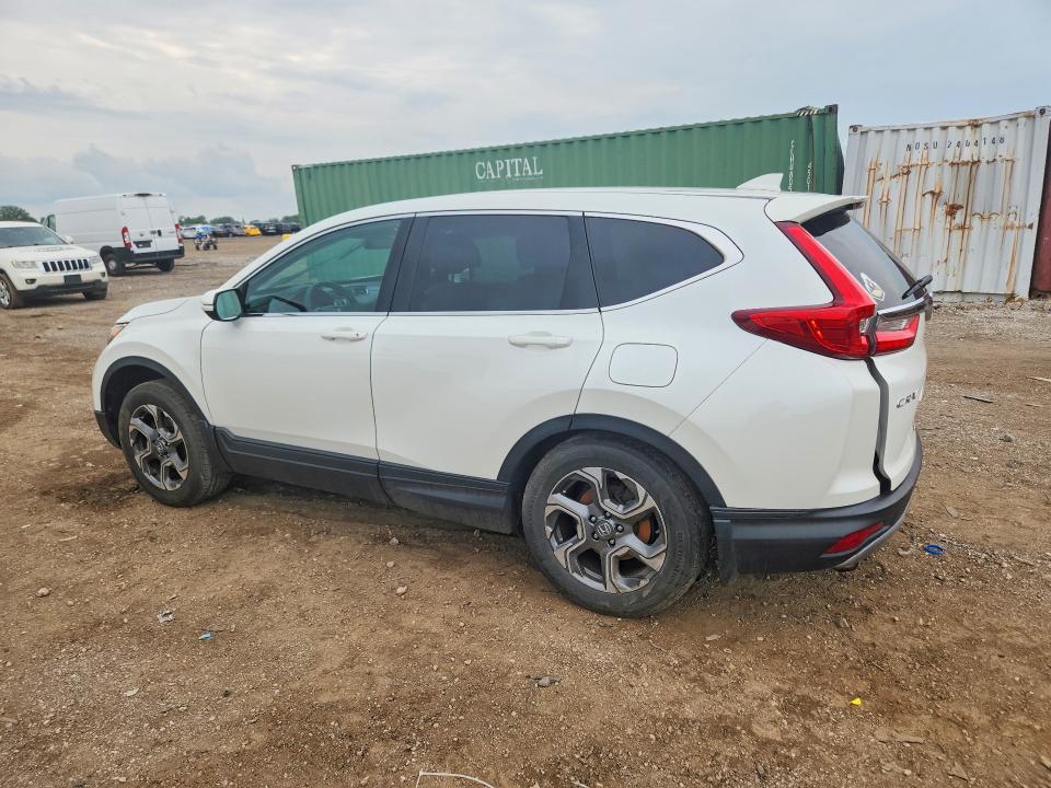 Photo 2 from auction – 2018 HONDA CR-V with VIN 5J6RW2H55JL034074