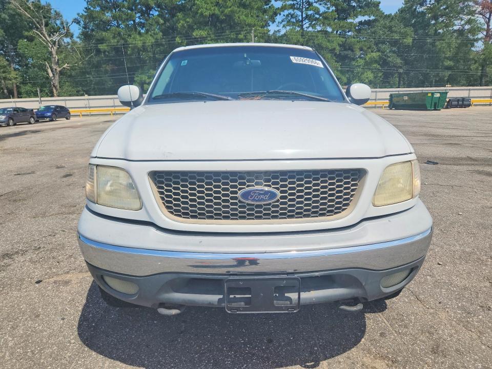 Photo 5 from auction – 2001 FORD F150 with VIN 1FTRW08L31KB97658