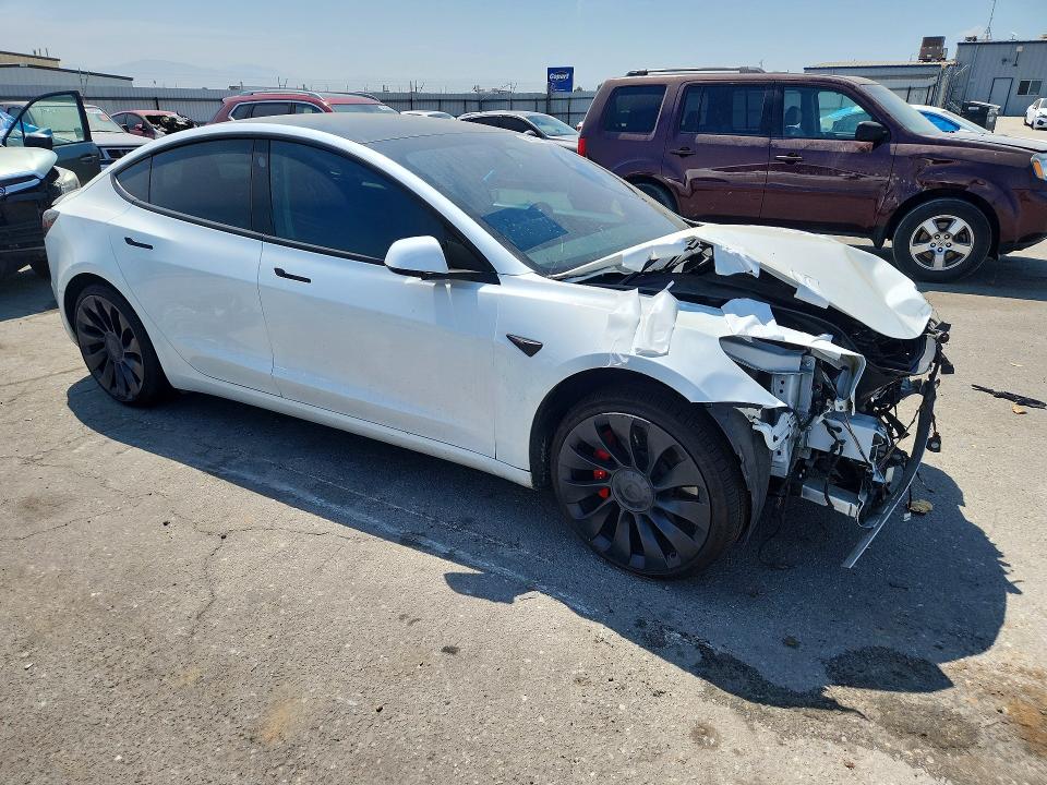 Photo 4 from auction – 2021 TESLA MODEL 3 with VIN 5YJ3E1EC5MF850883