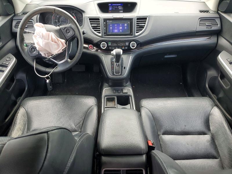 Photo 8 from auction – 2016 HONDA CR-V with VIN 5J6RM4H70GL067592