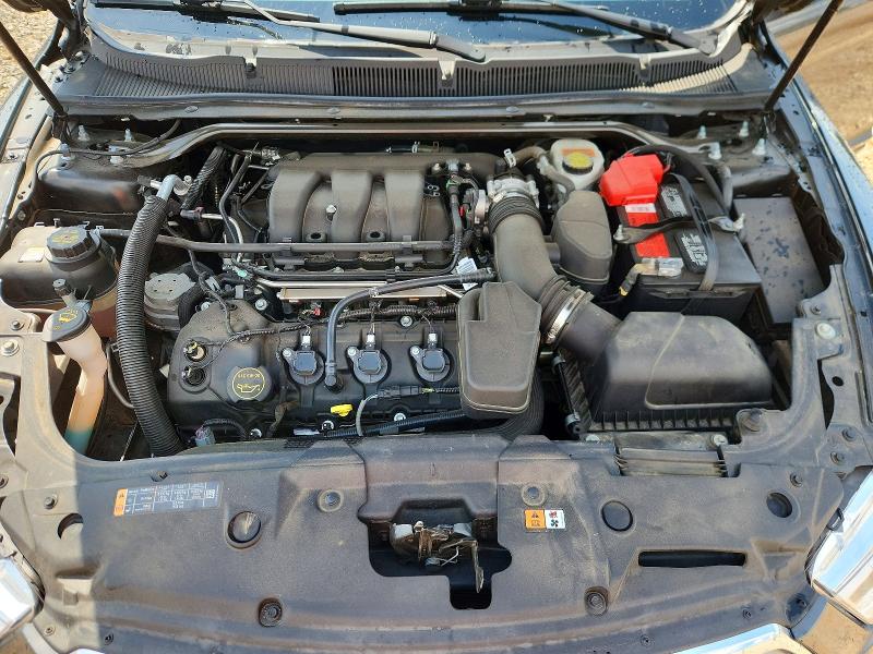 Photo 11 from auction – 2018 FORD TAURUS with VIN 1FAHP2E85JG132369