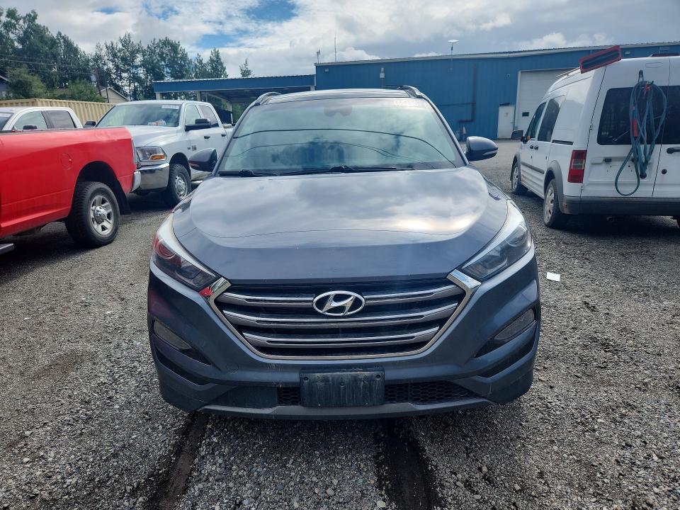 Photo 5 from auction – 2016 HYUNDAI TUCSON with VIN KM8J3CA2XGU179255