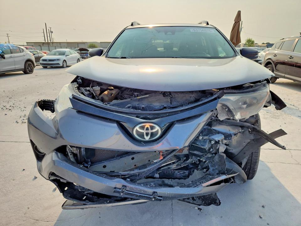 Photo 5 from auction – 2018 TOYOTA RAV4 with VIN 2T3WFREV0JW439827