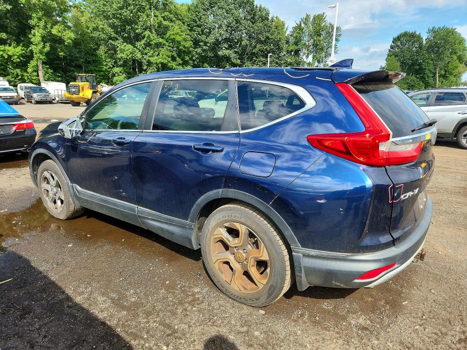 Photo 2 from auction – 2018 HONDA CR-V with VIN 2HKRW2H53JH643948