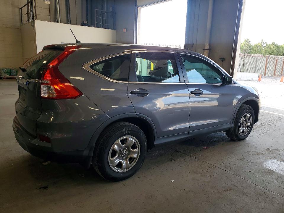 Photo 3 from auction – 2015 HONDA CR-V with VIN 3CZRM3H32FG714660