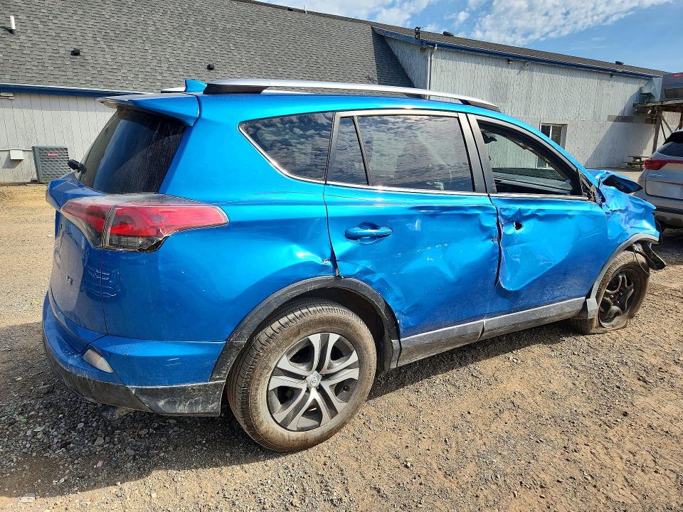 Photo 3 from auction – 2017 TOYOTA RAV4 with VIN JTMZFREV5HJ124947