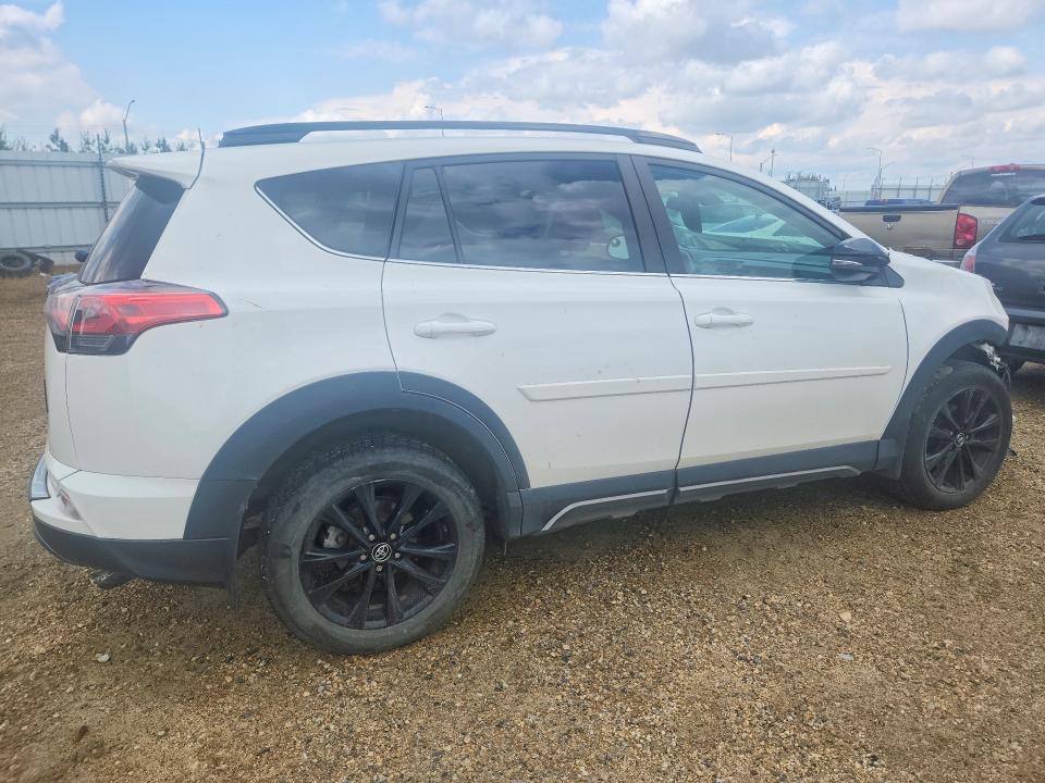 Photo 3 from auction – 2018 TOYOTA RAV4 with VIN 2T3RFREV8JW833458