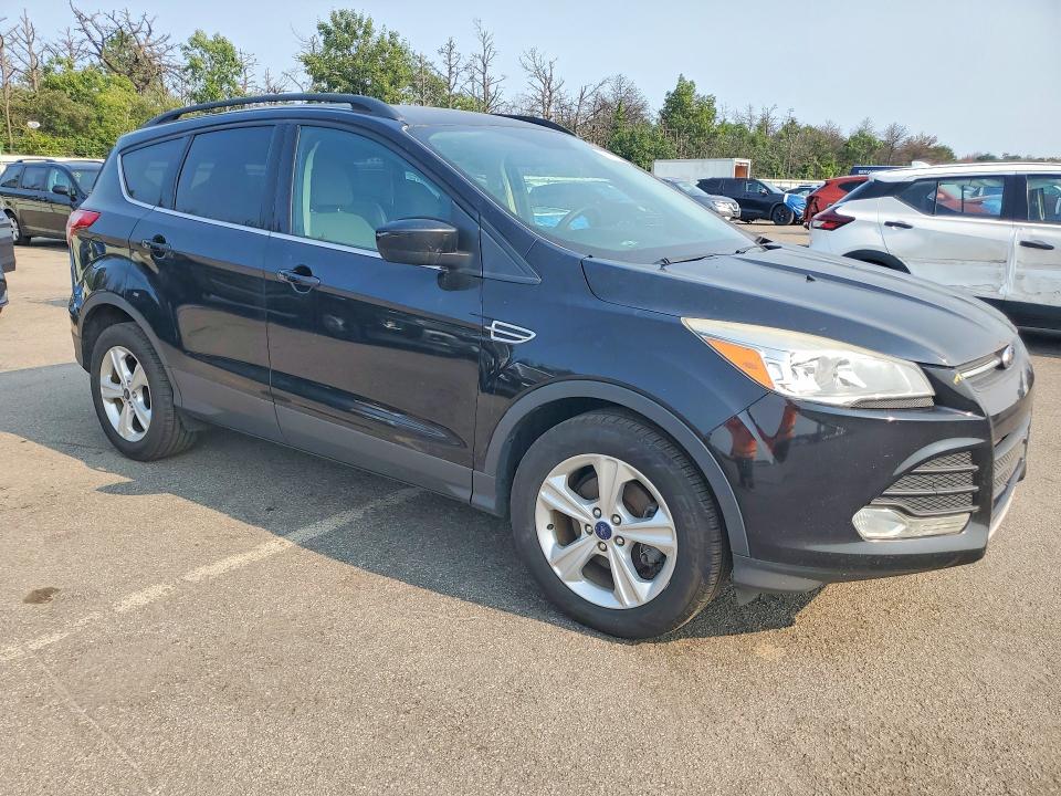 Photo 4 from auction – 2016 FORD ESCAPE with VIN 1FMCU0GX8GUA63981