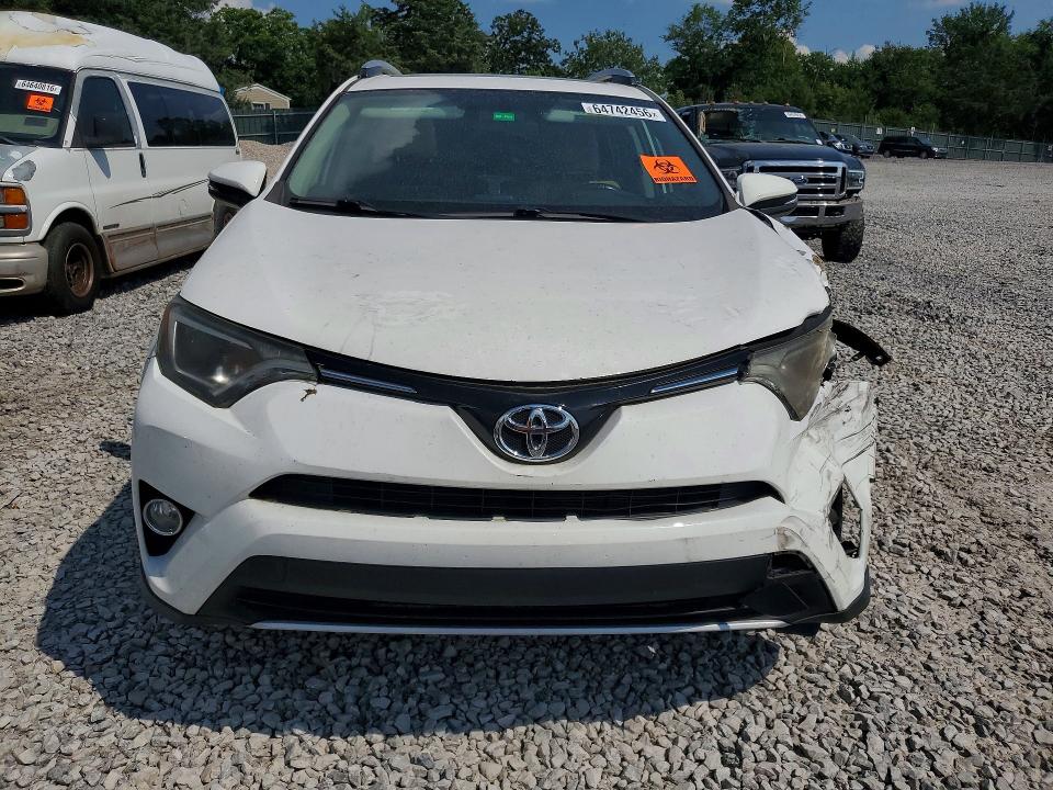 Photo 5 from auction – 2016 TOYOTA RAV4 with VIN 2T3WFREV4GW288578