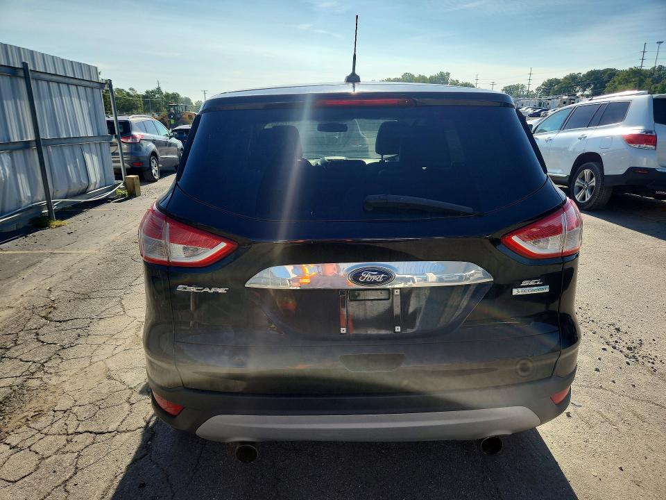 Photo 6 from auction – 2013 FORD ESCAPE with VIN 1FMCU0HX0DUB57220