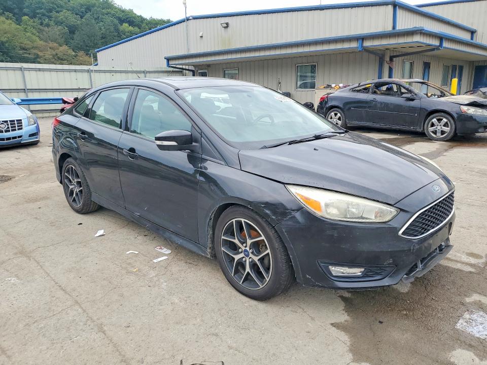 Photo 4 from auction – 2015 FORD FOCUS with VIN 1FADP3F23FL356298