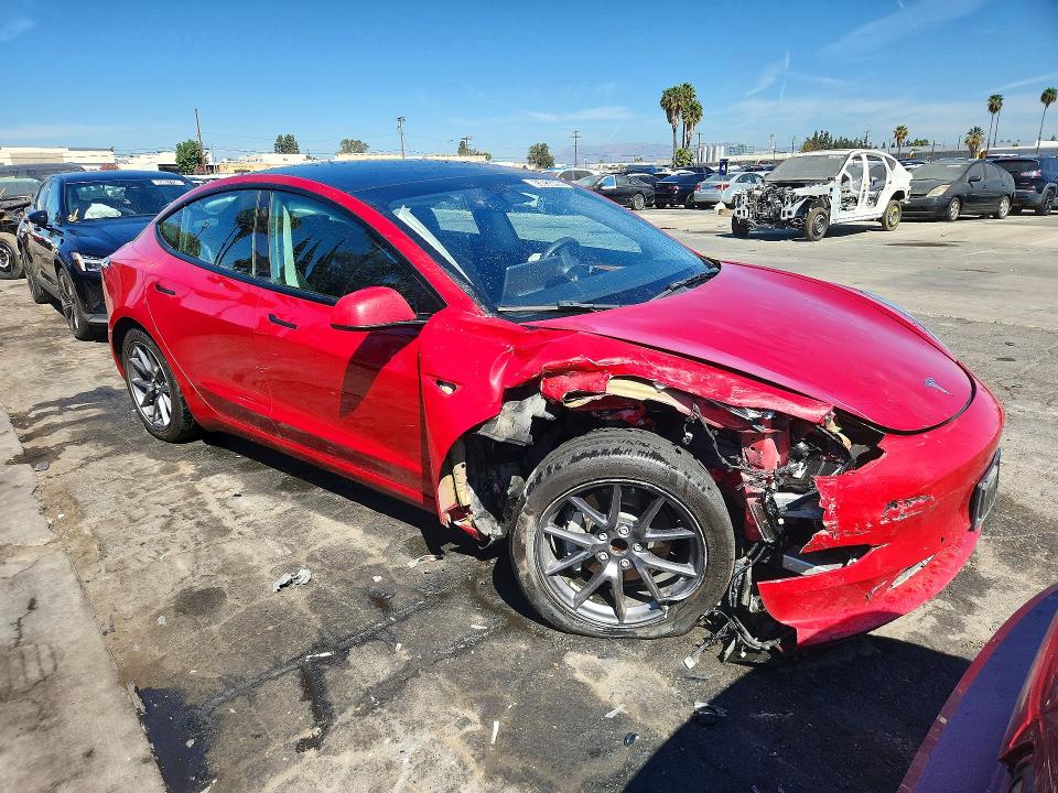 Photo 4 from auction – 2022 TESLA MODEL 3 with VIN 5YJ3E1EA1NF287590