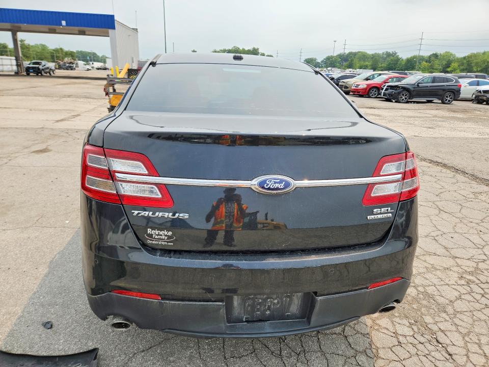 Photo 6 from auction – 2015 FORD TAURUS with VIN 1FAHP2E80FG102154