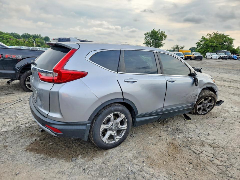 Photo 3 from auction – 2017 HONDA CR-V with VIN 7FARW1H86HE028313