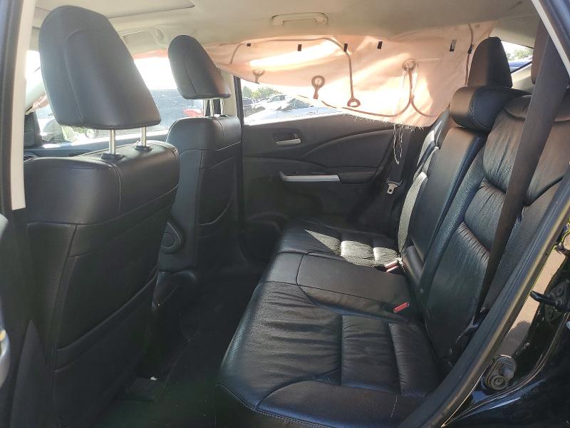 Photo 11 from auction – 2014 HONDA CR-V with VIN 2HKRM4H94EH131478