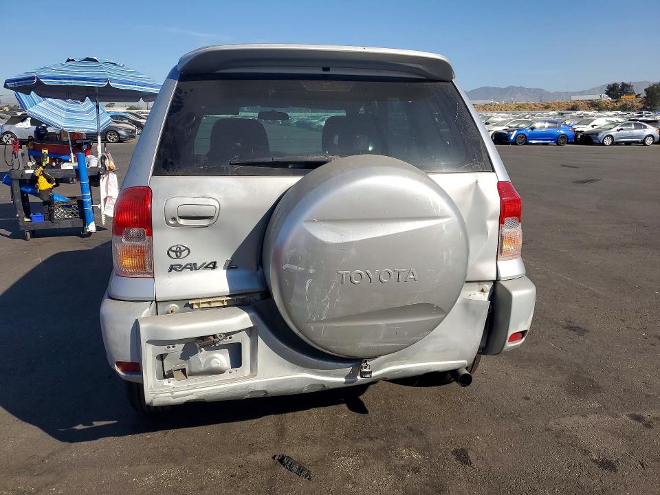 Photo 6 from auction – 2002 TOYOTA RAV4 with VIN JTEGH20V320073246