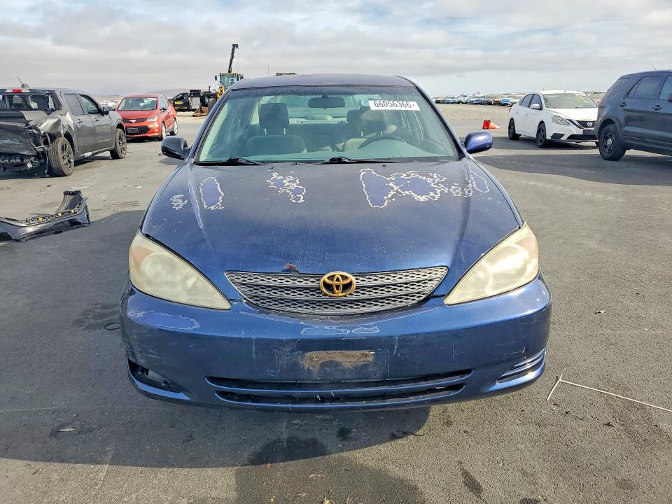 Photo 5 from auction – 2002 TOYOTA CAMRY with VIN JTDBE32K020096063