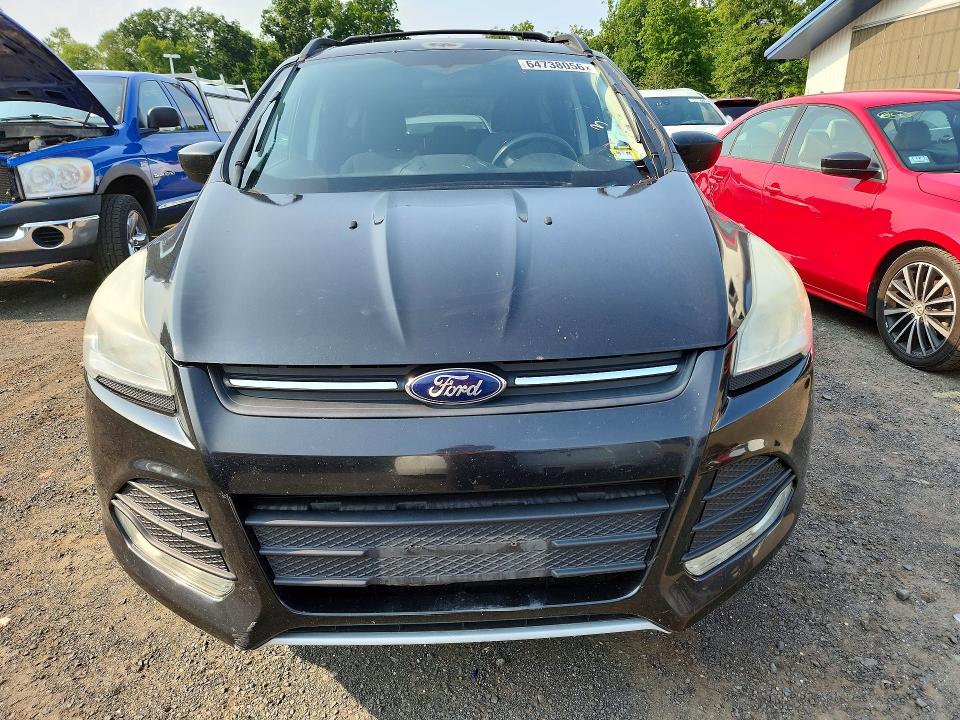 Photo 5 from auction – 2014 FORD ESCAPE with VIN 1FMCU9G98EUE04749