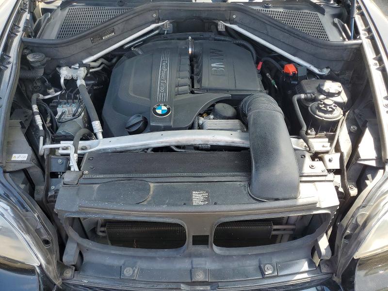Photo 12 from auction – 2013 BMW X5 with VIN 5UXZV4C5XD0G55412
