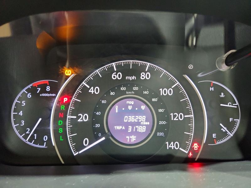 Photo 9 from auction – 2015 HONDA CR-V with VIN 2HKRM4H30FH610302