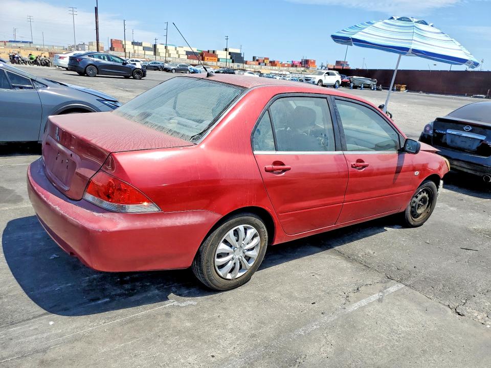 Photo 3 from auction – 2004 MITSUBISHI LANCER with VIN JA3AJ26E14U010520