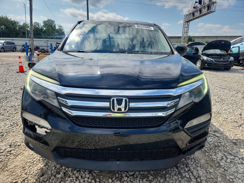 Photo 5 from auction – 2016 HONDA PILOT with VIN 5FNYF6H58GB079255