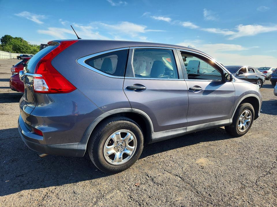 Foto 3 de la subasta – 2015 HONDA CR-V con VIN 5J6RM4H31FL015027