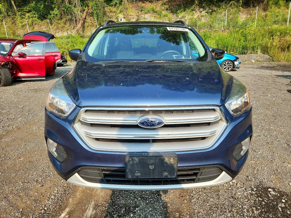 Photo 5 from auction – 2018 FORD ESCAPE with VIN 1FMCU9GD8JUC61719