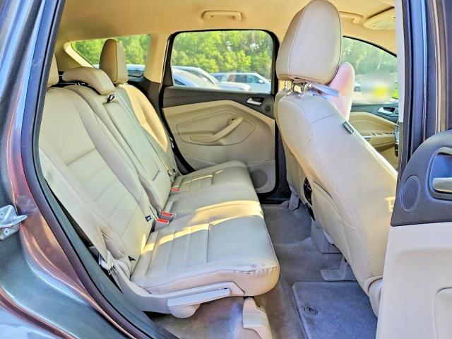 Photo 11 from auction – 2014 FORD ESCAPE with VIN 1FMCU0JX4EUB05648