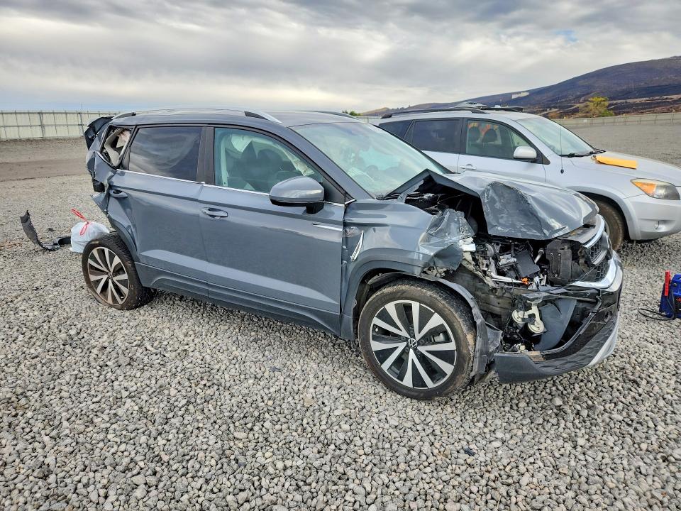 Снимка 4 от търг – 2022 VOLKSWAGEN TAOS с VIN 3VVRX7B23NM096657