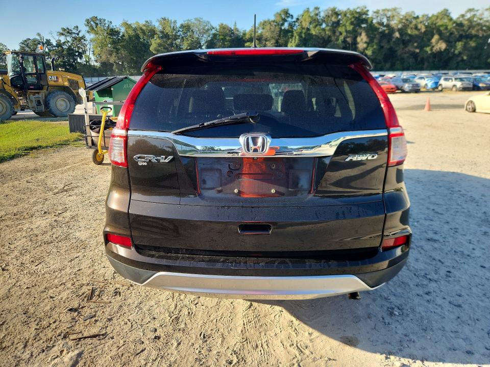 Photo 6 from auction – 2015 HONDA CR-V with VIN 2HKRM4H73FH125543