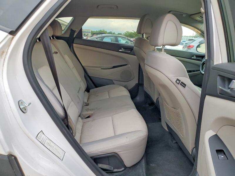 Photo 11 from auction – 2017 HYUNDAI TUCSON with VIN KM8J3CA44HU297465