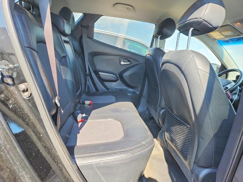 Photo 11 from auction – 2011 HYUNDAI TUCSON with VIN KM8JUCAC0BU178713