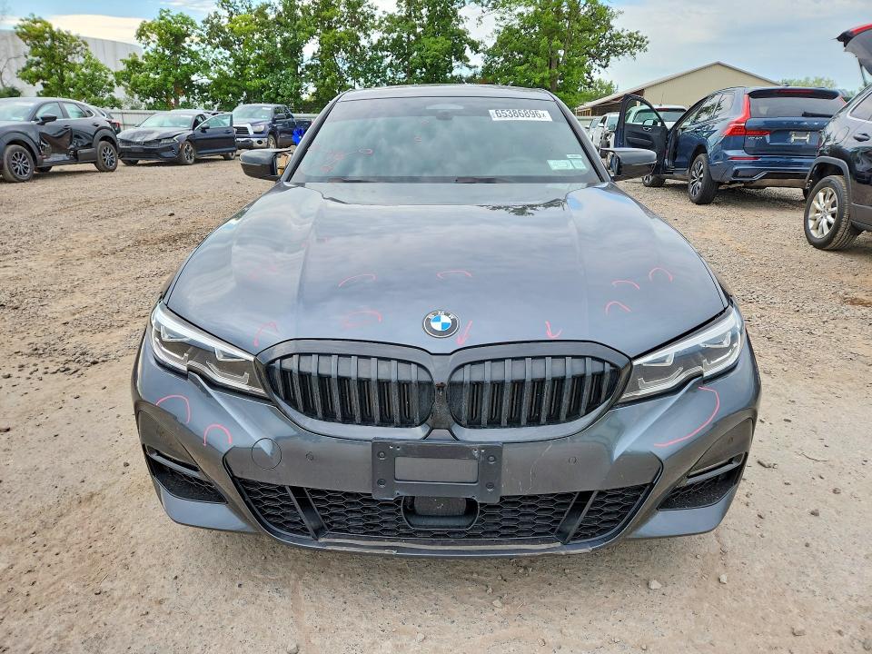 Photo 5 from auction – 2021 BMW 330XI with VIN 3MW5R7J0XM8B82138