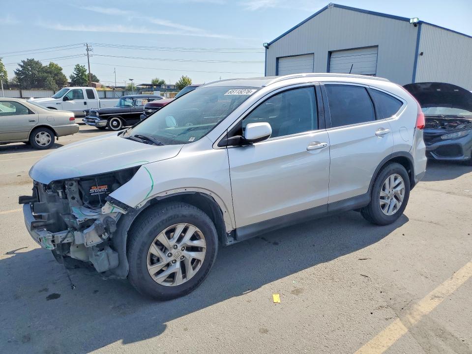 HONDA CR-V 2015 with VIN 2HKRM4H76FH617368 - Photo from auction