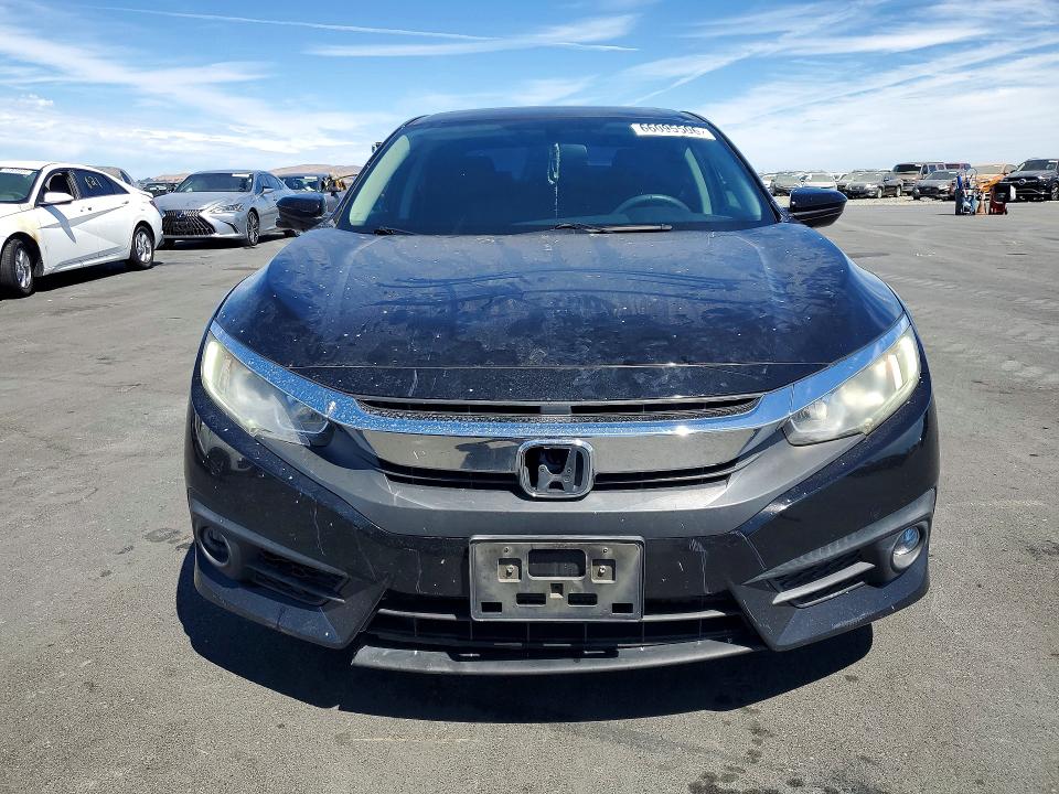 Photo 5 from auction – 2017 HONDA CIVIC with VIN 2HGFC1F34HH647776