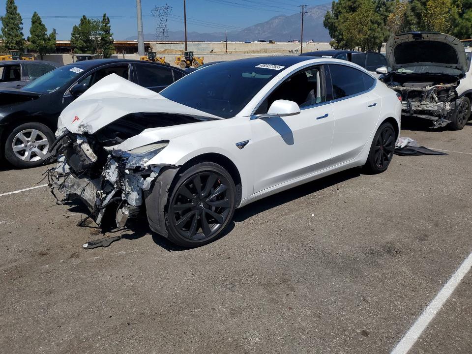 TESLA MODEL 3 2018 with VIN 5YJ3E1EA2JF038726 - Photo from auction