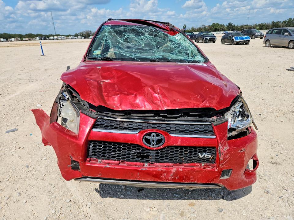 Photo 5 from auction – 2010 TOYOTA RAV4 with VIN JTMYK4DV8AD003877