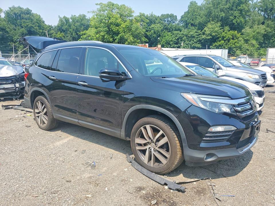 Photo 4 from auction – 2017 HONDA PILOT with VIN 5FNYF6H94HB065180