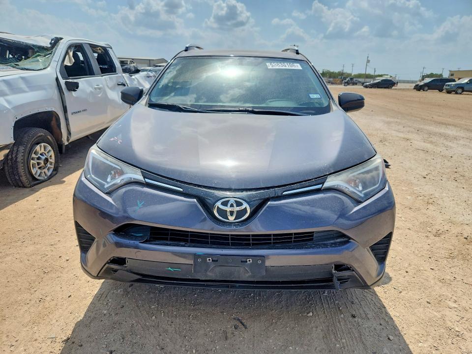 Photo 5 from auction – 2016 TOYOTA RAV4 with VIN JTMZFREV5GJ096663