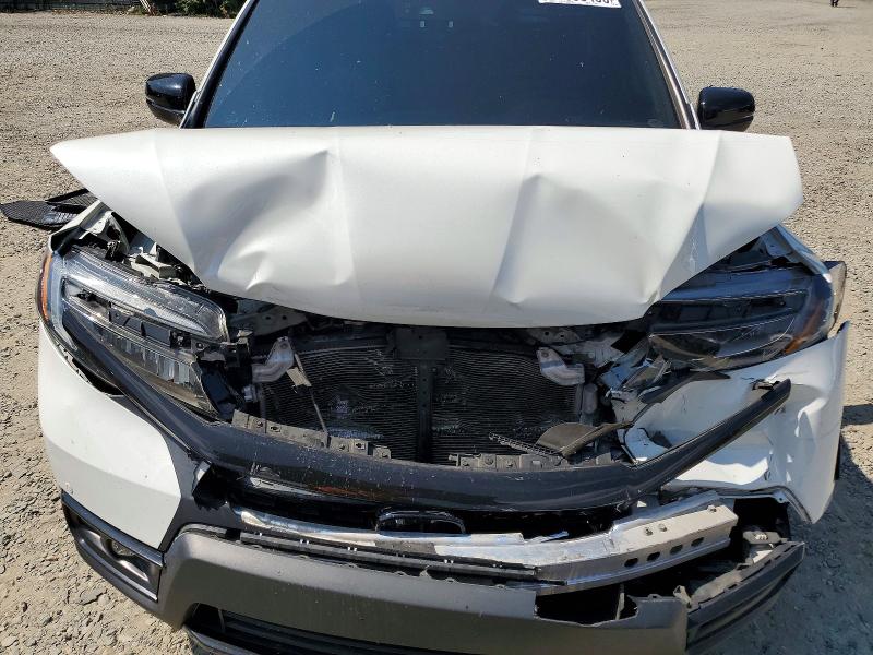 Photo 12 from auction – 2021 HONDA PASSPORT with VIN 5FNYF8H00MB013794