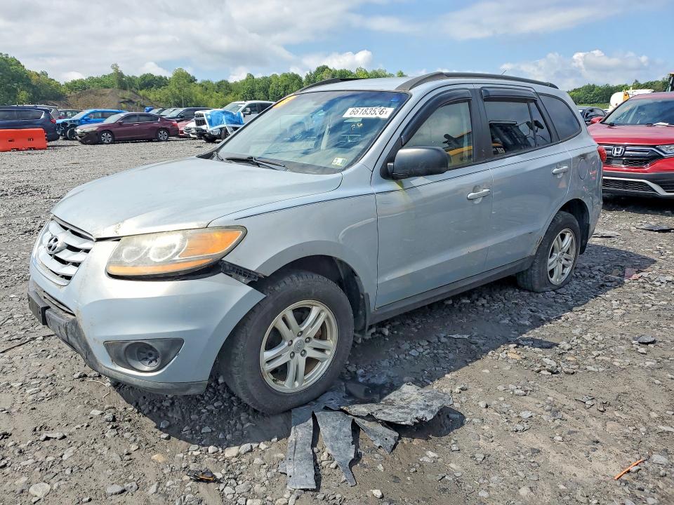 HYUNDAI SANTA FE 2010 with VIN 5NMSG3AB5AH385983 - Photo from auction